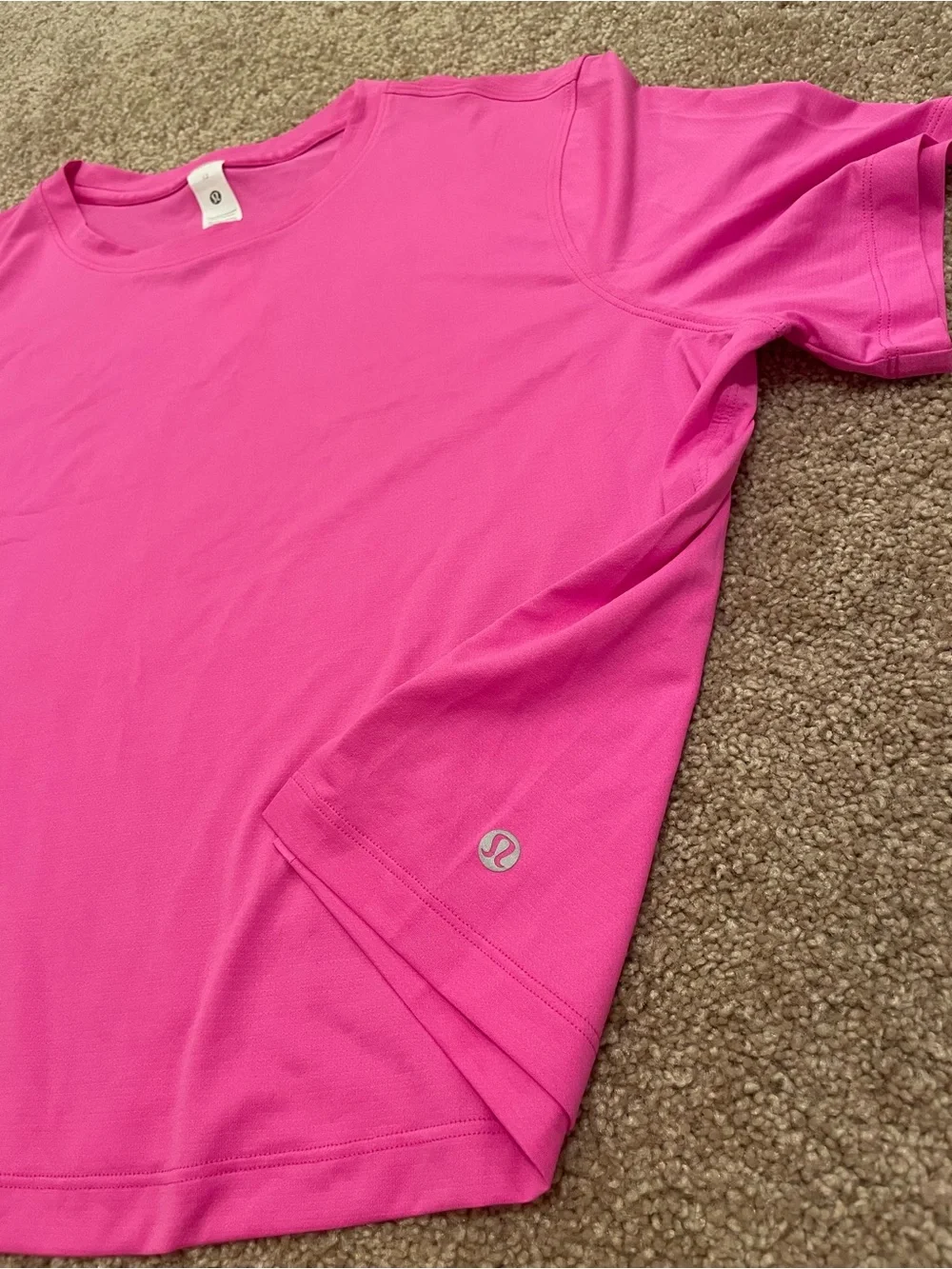 Lululemon Ultralight Waist-Length T-Shirt in pow pink color